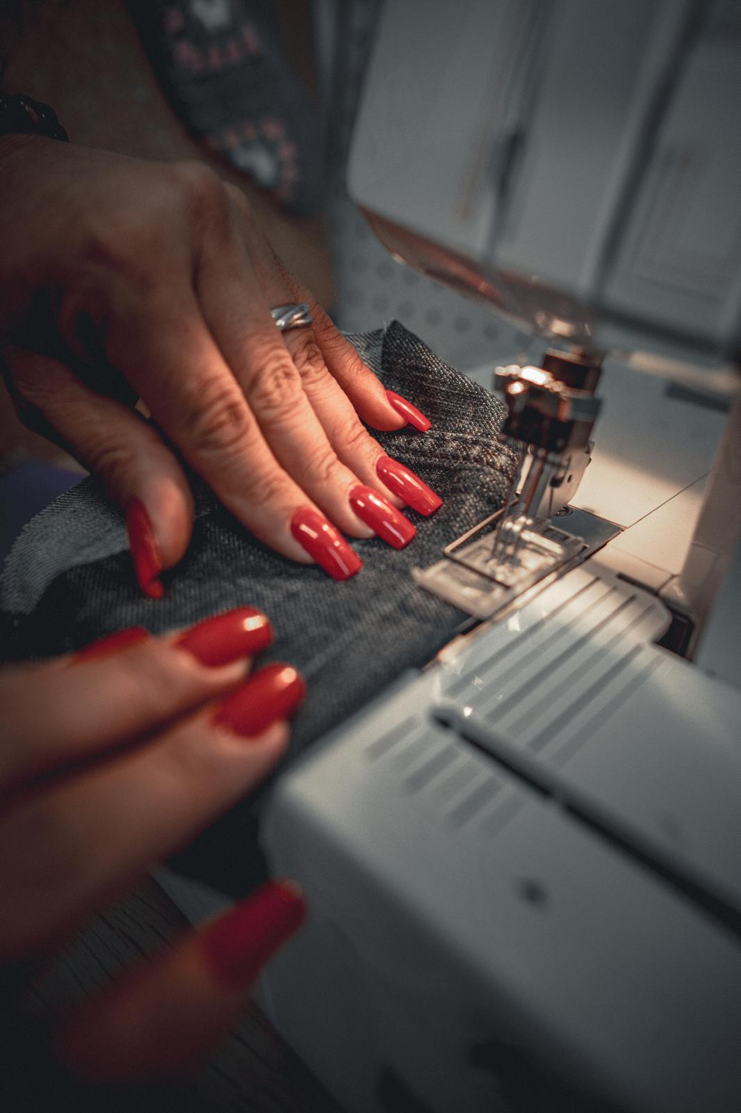 Close-up of tailoring work at a sewing machine
